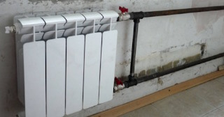 Установка биметаллических радиаторов отопления в квартире в Костомукше - от 2100 руб.
